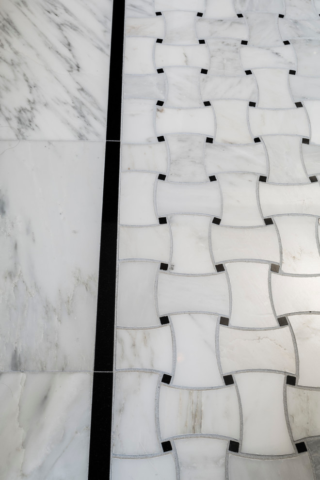 Inspiration for a contemporary master bathroom in Providence with a curbless shower, black and white tile, grey walls and marble floors.