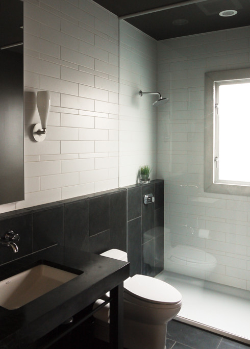 Design ideas for a small contemporary 3/4 bathroom in Seattle with open cabinets, black cabinets, a curbless shower, a one-piece toilet, black and white tile, ceramic tile, beige walls, slate floors, an undermount sink and soapstone benchtops.