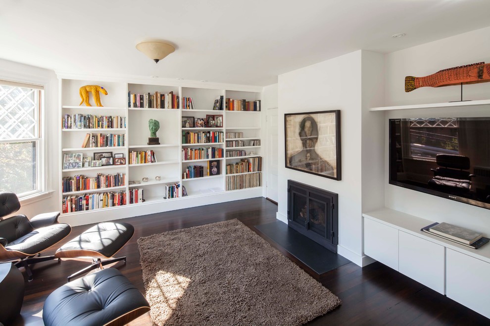 Trendy family room photo in Boston with white walls