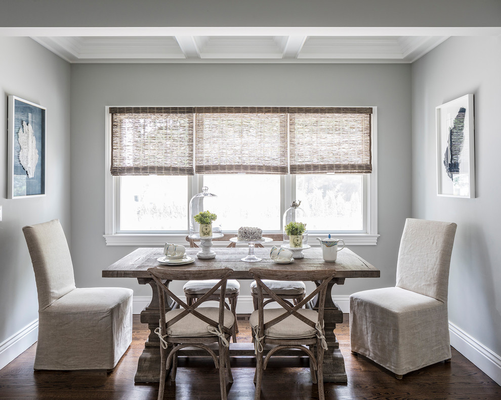 Inspiration for a transitional dining room in New York with grey walls, dark hardwood floors and brown floor.