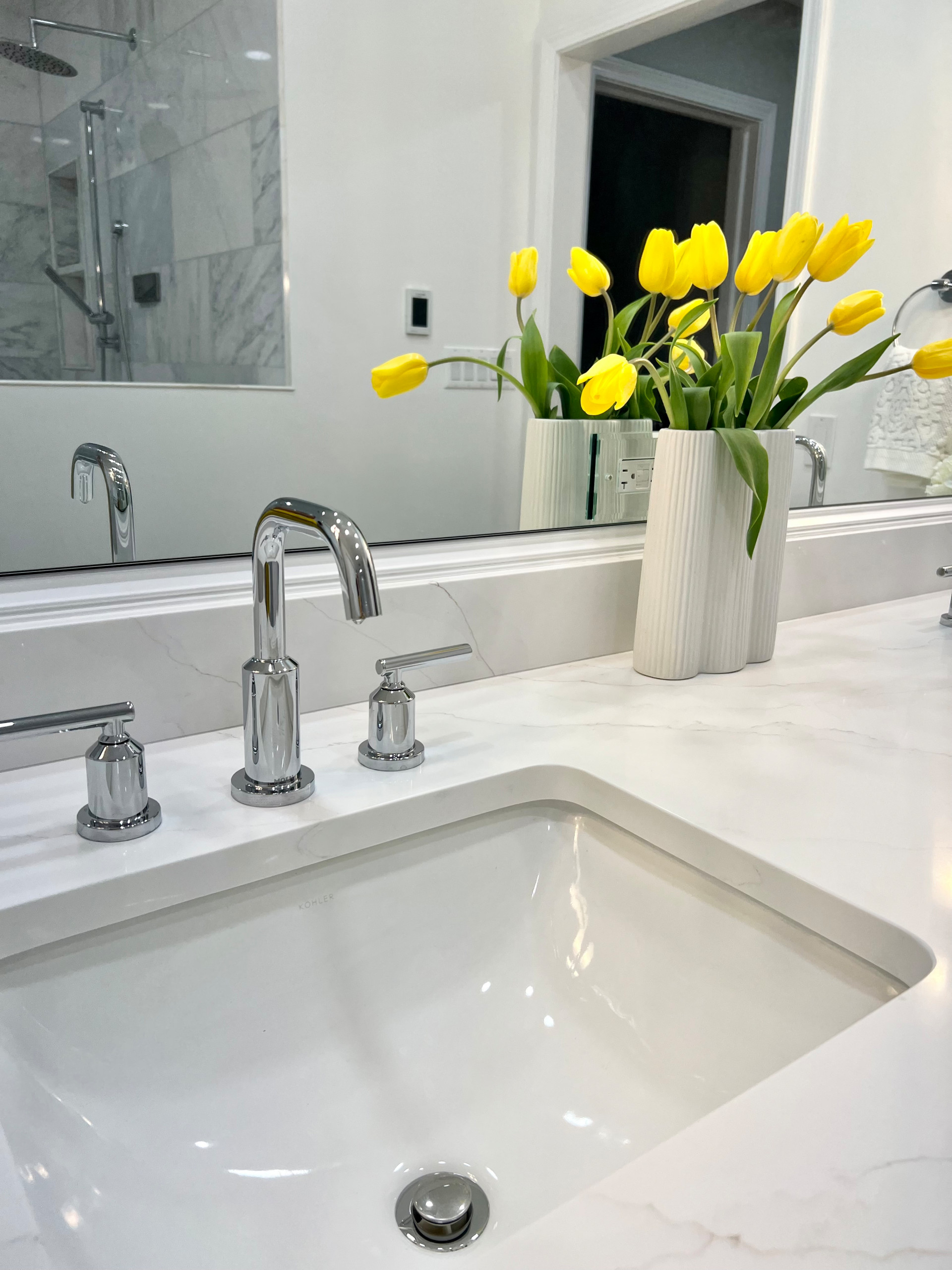 Two Traditionally Designed Bathrooms