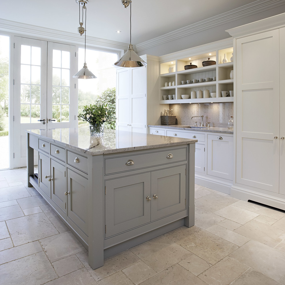 Design ideas for a mid-sized transitional open plan kitchen in Manchester with grey cabinets, granite benchtops, marble floors, with island and beaded inset cabinets.