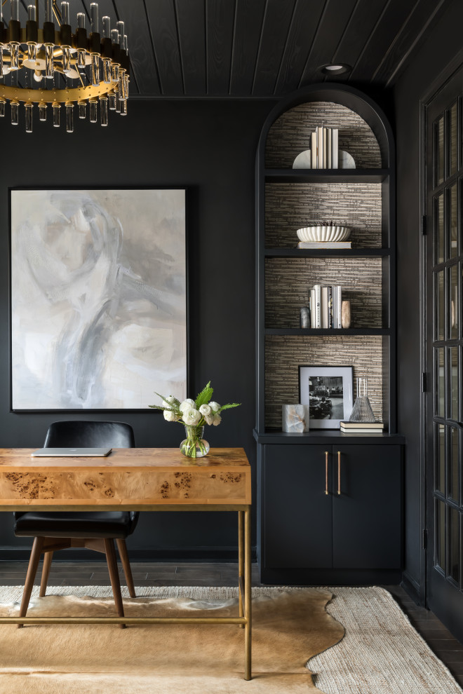 Example of a mid-sized minimalist built-in desk dark wood floor, black floor, wood ceiling and wallpaper study room design in Atlanta with black walls