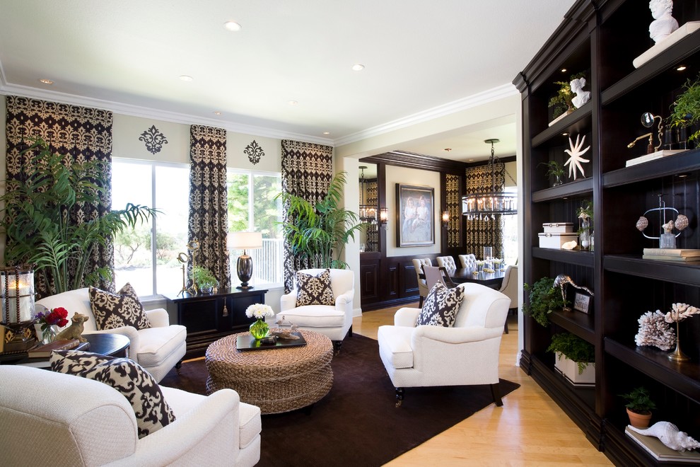 Inspiration for a large transitional formal open concept living room in San Diego with green walls, light hardwood floors, no fireplace and no tv.