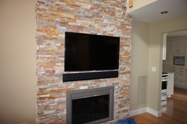 Over Fireplace Led Tv Installation With Sound Bar On Brick