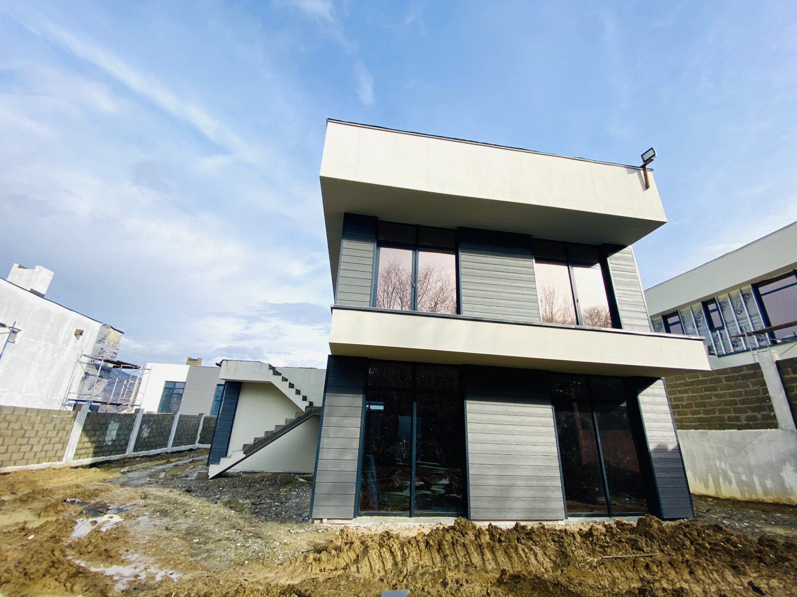 Отделка фасадов коттеджного поселка