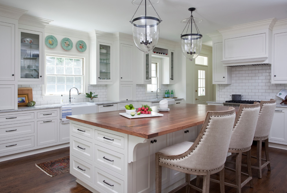 Design ideas for a kitchen in Atlanta with a farmhouse sink, recessed-panel cabinets and with island.