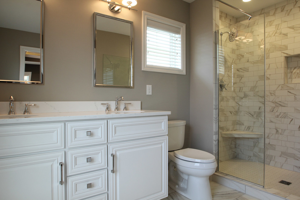 Design ideas for a small transitional master bathroom in Cedar Rapids with an undermount sink, recessed-panel cabinets, white cabinets, quartzite benchtops, a double shower, a two-piece toilet, white tile, ceramic tile, grey walls and ceramic floors.
