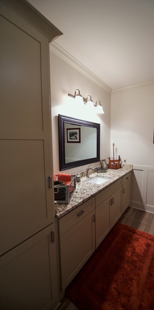 Example of a mid-sized mountain style kids' beige tile and porcelain tile porcelain tile alcove bathtub design with shaker cabinets, beige cabinets, granite countertops and a two-piece toilet