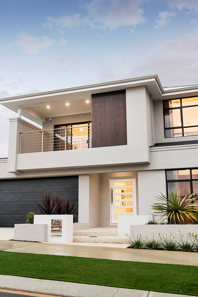 Photo of a large contemporary two-storey white house exterior in Perth with wood siding, a hip roof and a metal roof.