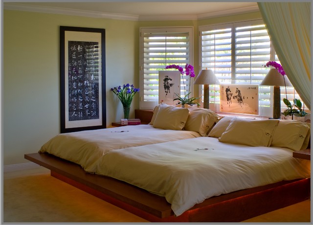 Double queen beds for an old married couple contemporary-bedroom