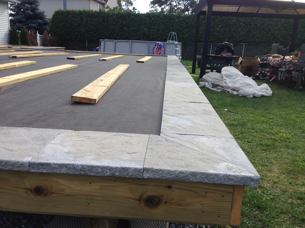 Huge transitional backyard deck photo