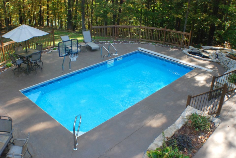 Inspiration for a mid-sized backyard rectangular pool remodel in Indianapolis
