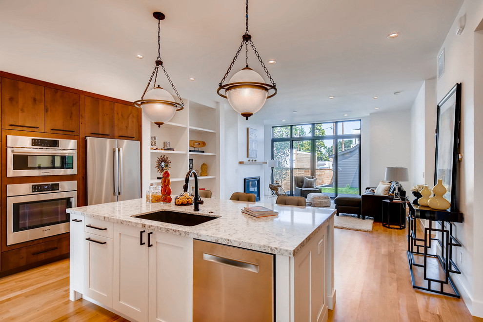 Example of a transitional kitchen design in Denver