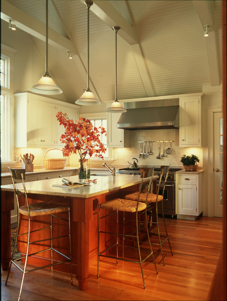 This is an example of a traditional kitchen in New York with stainless steel appliances.