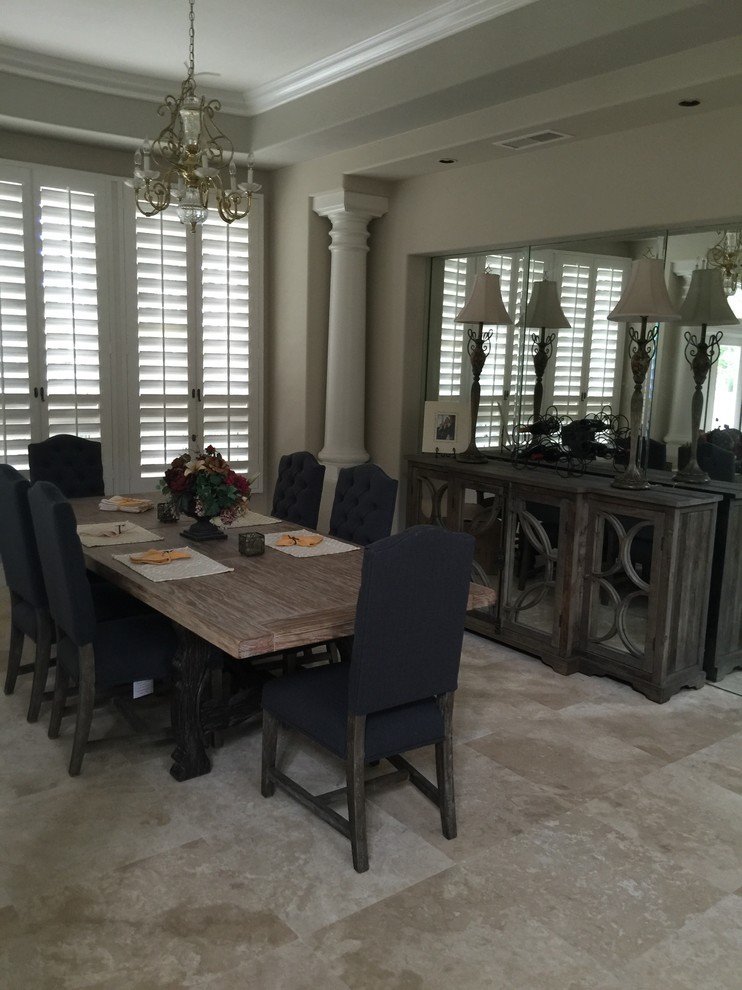 Photo of a large traditional open plan dining in Orange County with grey walls, travertine floors, no fireplace and beige floor.