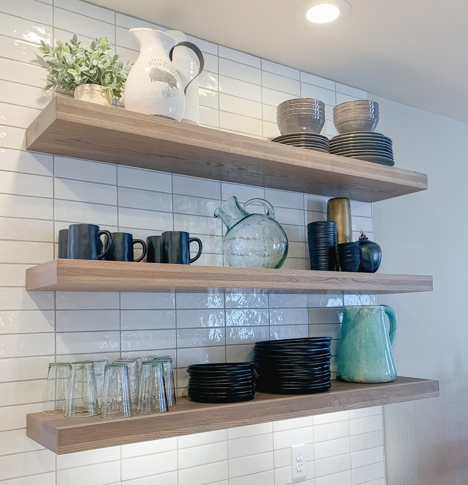 Mid-sized transitional u-shaped medium tone wood floor open concept kitchen photo in Denver with a farmhouse sink, flat-panel cabinets, turquoise cabinets, quartzite countertops, white backsplash, ceramic backsplash, stainless steel appliances and white countertops