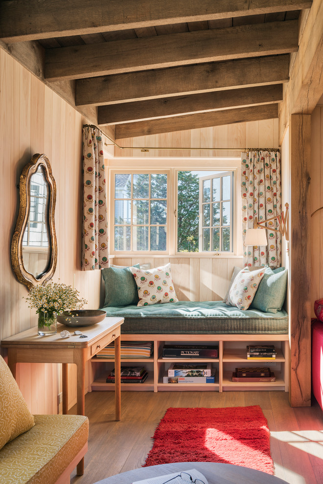 Example of a beach style family room design in New York