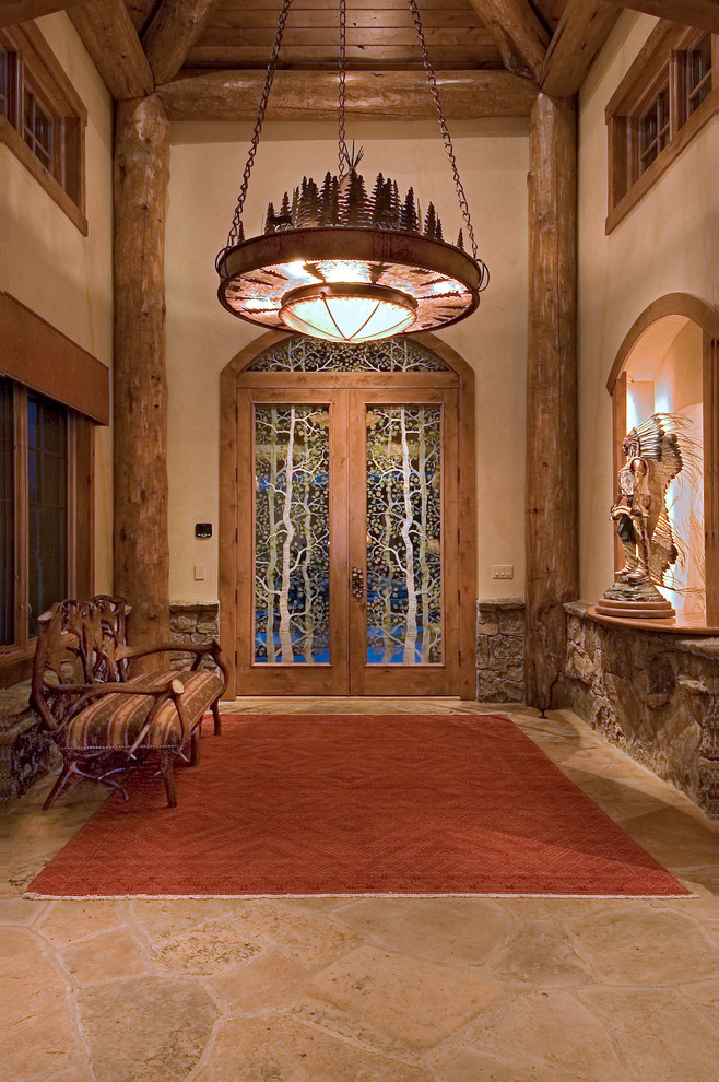 Mountain style entryway photo in Denver