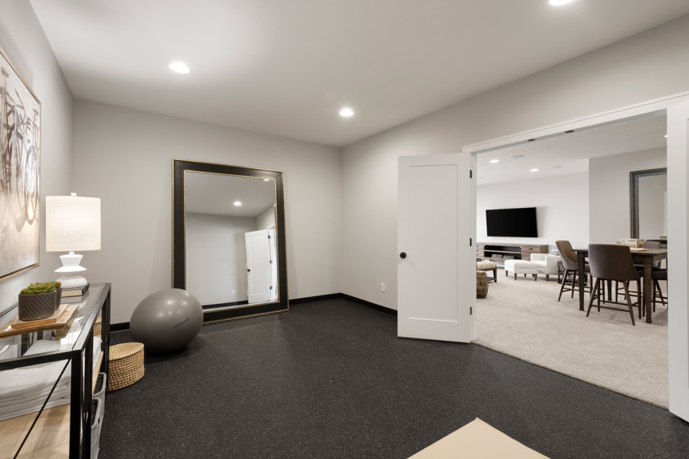 Design ideas for a classic multi-use home gym in Minneapolis with white walls.