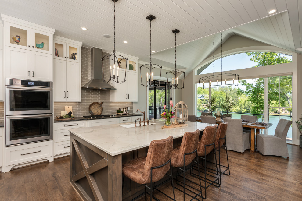 Inspiration for a large timeless shiplap ceiling kitchen remodel in Other with an island