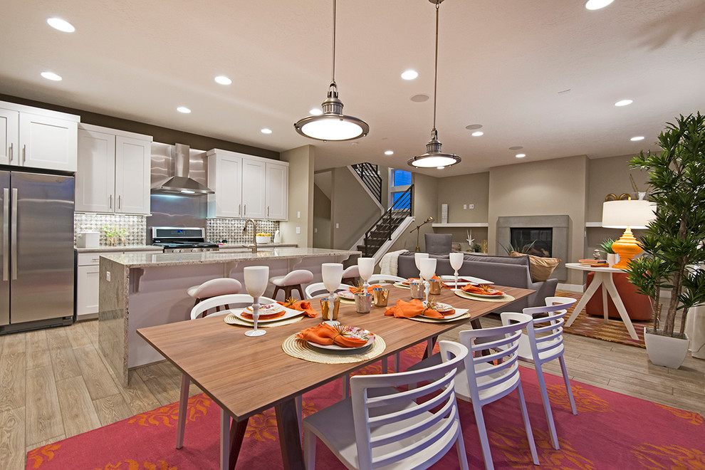 Design ideas for a mid-sized contemporary open plan dining in Salt Lake City with beige walls.