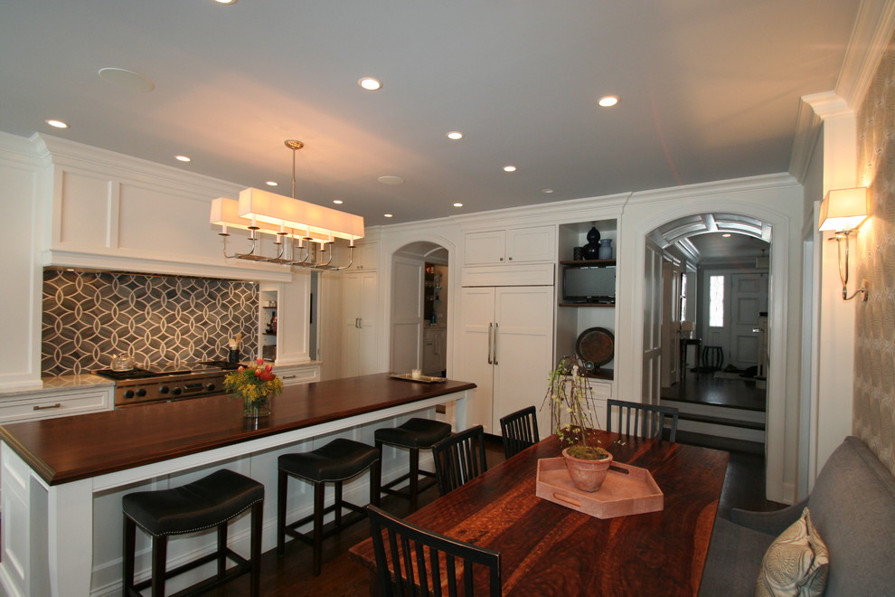 Large transitional l-shaped dark wood floor open concept kitchen photo in Chicago with flat-panel cabinets, white cabinets, granite countertops, blue backsplash, ceramic backsplash, stainless steel appliances and an island