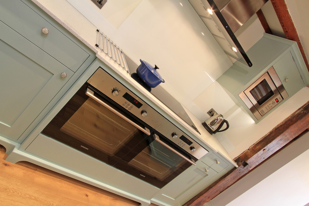 Photo of a transitional kitchen in Hampshire.
