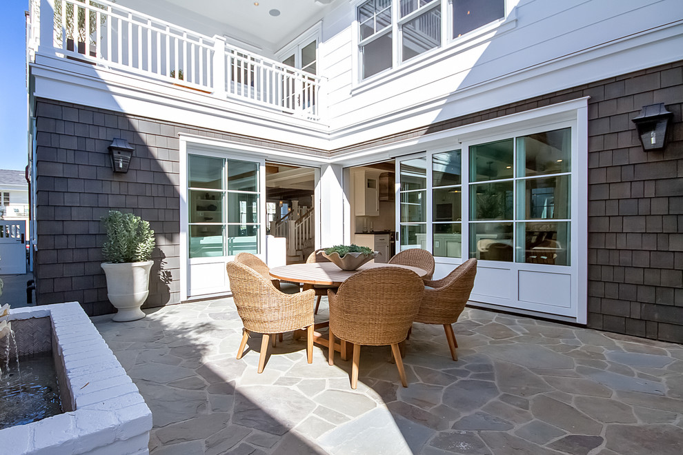 Photo of a beach style patio in Orange County.