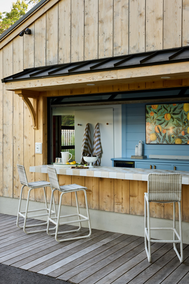 Beach style shed photo in New York