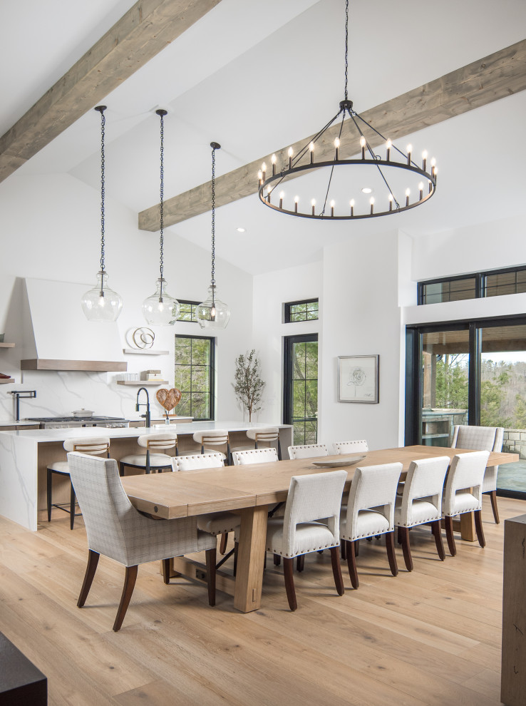 Transitional medium tone wood floor dining room photo