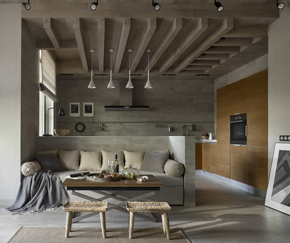 This is an example of a contemporary living room in Moscow with grey walls, grey floor and ceramic floors.