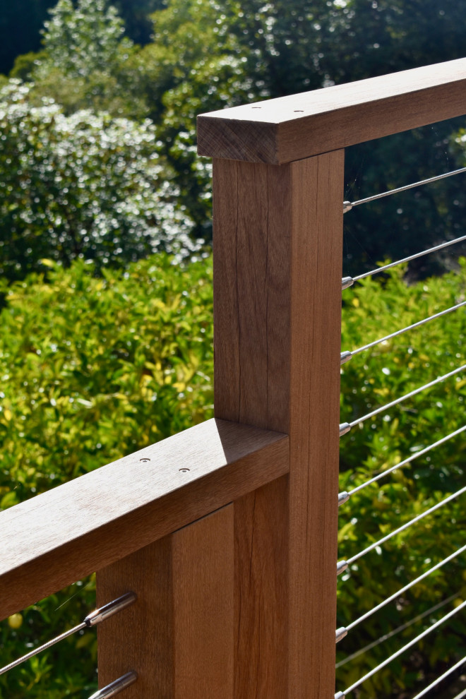 Deck - modern backyard second story cable railing deck idea