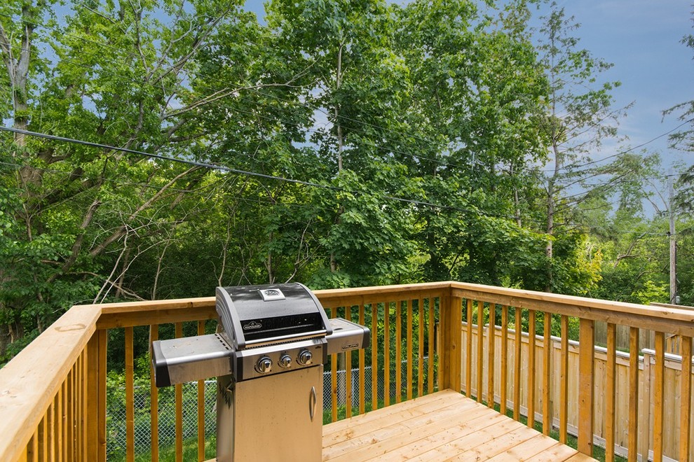 Transitional home design photo in Ottawa