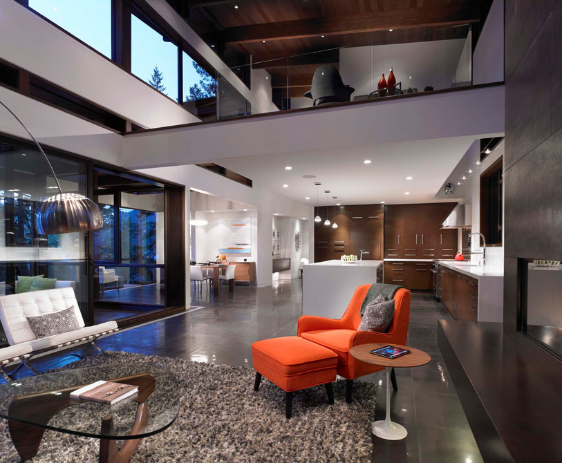 Photo of an expansive modern formal loft-style living room in Vancouver with white walls, porcelain floors, a tile fireplace surround and no tv.