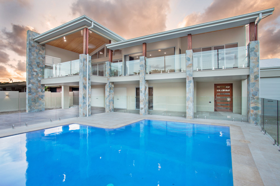 Inspiration for a large contemporary indoor custom-shaped pool in Brisbane with tile.