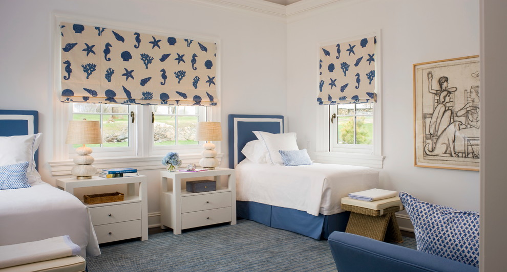 Example of a beach style guest bedroom design in Providence with white walls