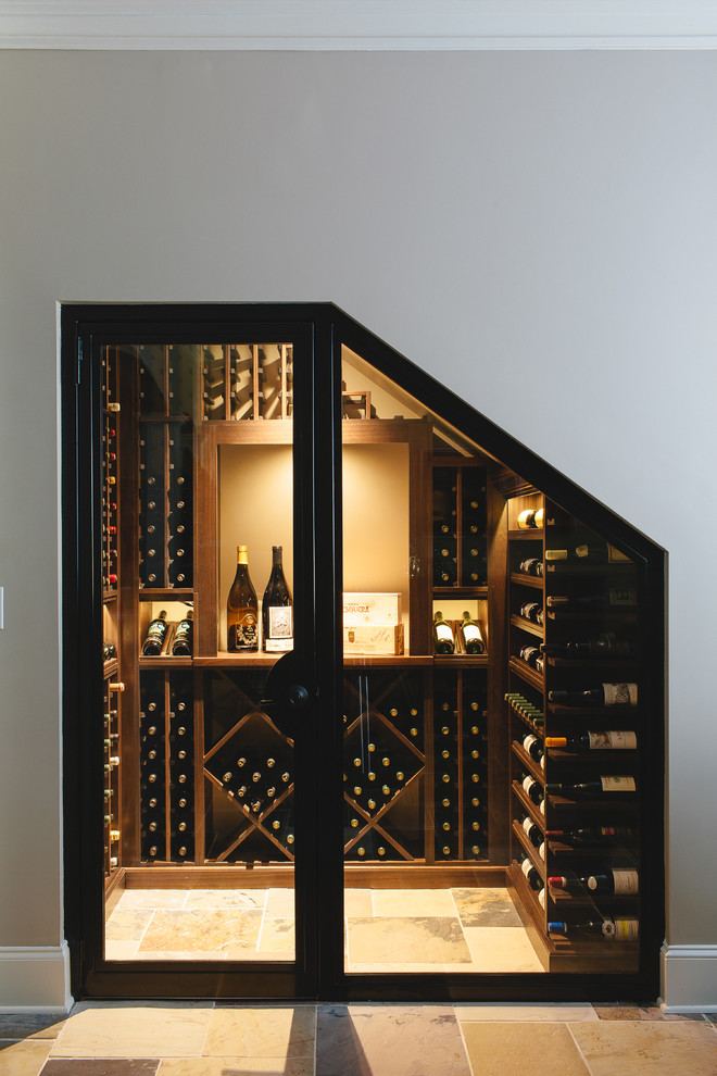 This is an example of a small traditional wine cellar in Atlanta with yellow floor.