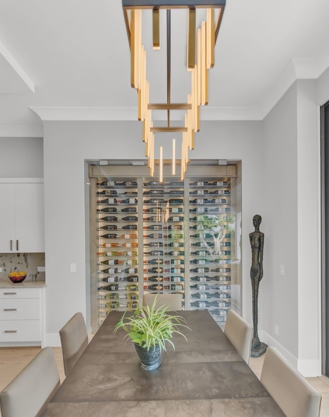 Design ideas for a contemporary wine cellar in Miami with display racks.