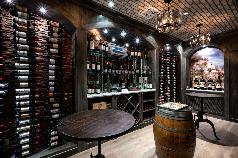 Example of a french country wine cellar design in Phoenix