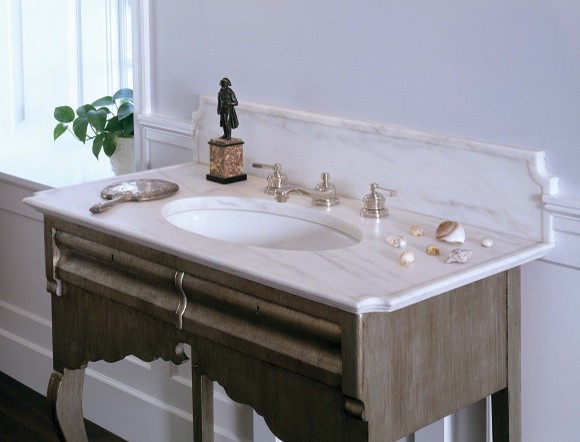 Design ideas for a large traditional bathroom in Portland Maine with a drop-in sink and marble benchtops.