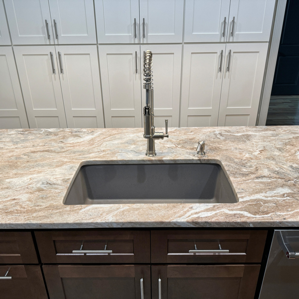 Eat-in kitchen - transitional galley medium tone wood floor and brown floor eat-in kitchen idea in Atlanta with an undermount sink, shaker cabinets, white cabinets, granite countertops, gray backsplash, ceramic backsplash, stainless steel appliances, an island and multicolored countertops