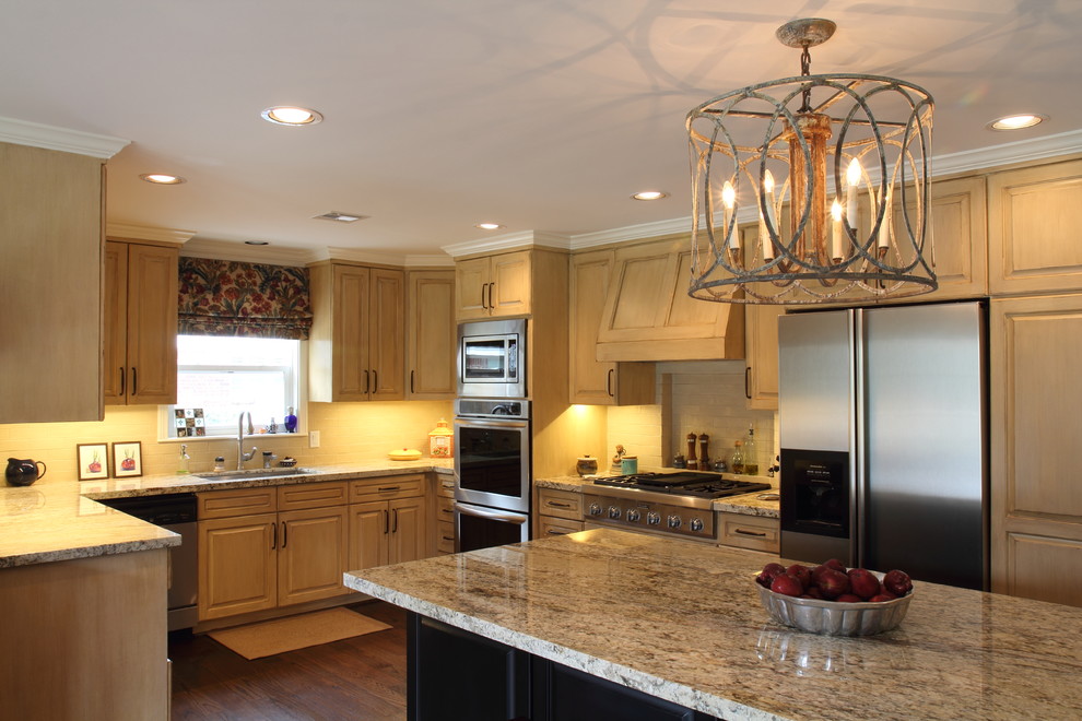 Example of a transitional kitchen design in Houston