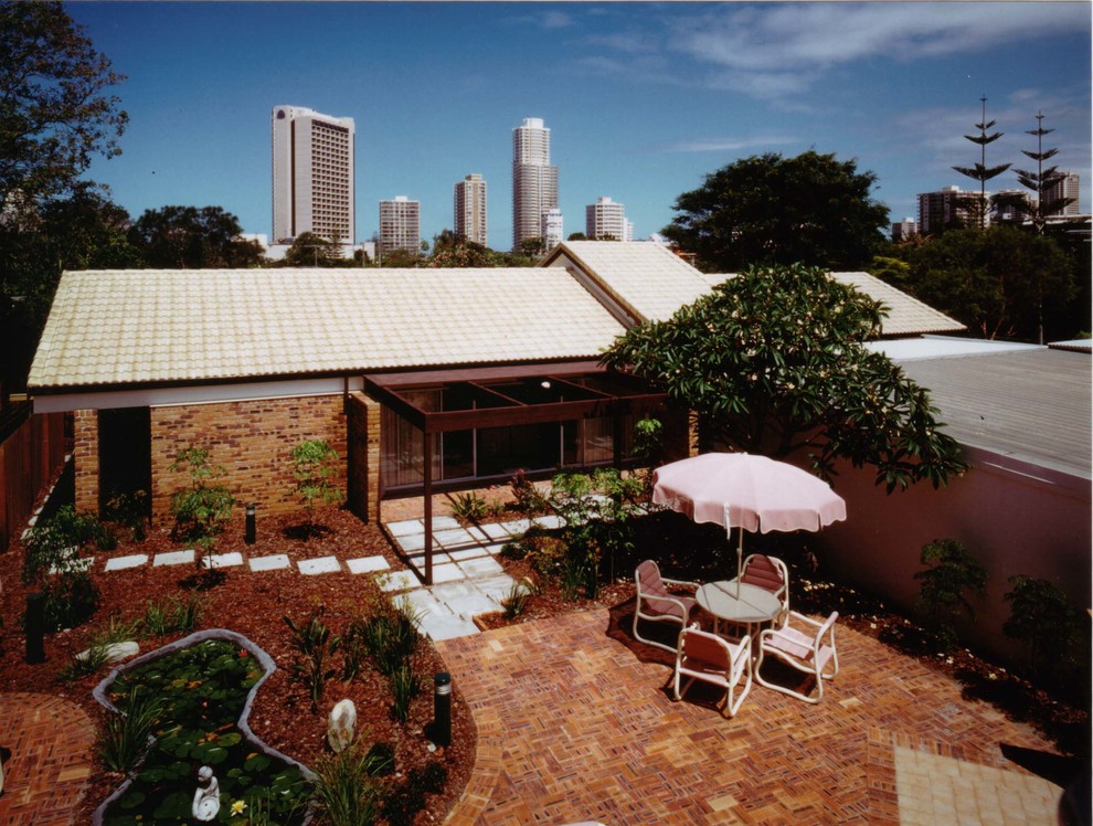 This is an example of a tropical patio in Gold Coast - Tweed.