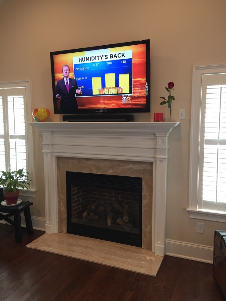 TV & SoundBar over Fireplace Contemporary New York by Square Peg