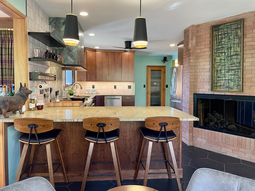 Photo of a mid-sized midcentury u-shaped eat-in kitchen in Other with an undermount sink, open cabinets, medium wood cabinets, quartzite benchtops, green splashback, porcelain splashback, stainless steel appliances, ceramic floors, a peninsula, black floor and green benchtop.