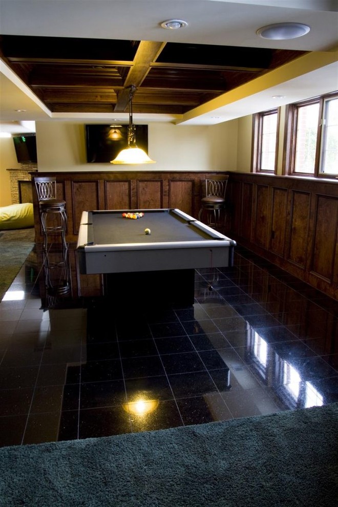 Mid-sized elegant underground ceramic tile basement photo in Grand Rapids with yellow walls