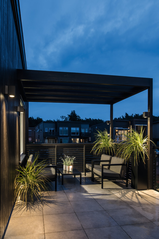 Design ideas for a scandinavian patio in Esbjerg.