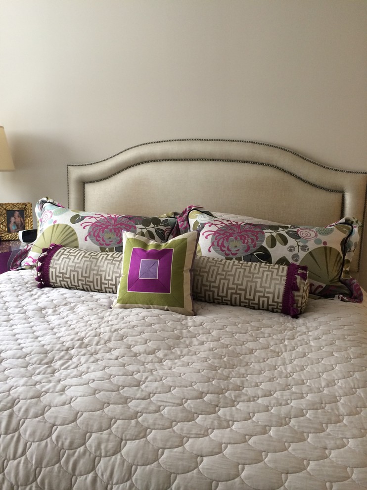 Inspiration for a mid-sized eclectic guest carpeted bedroom remodel in Raleigh with beige walls
