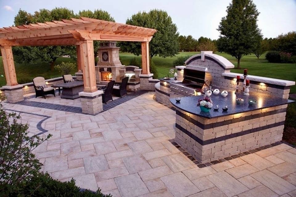 Design ideas for a medium sized contemporary back patio in Austin with an outdoor kitchen, concrete paving and a pergola.